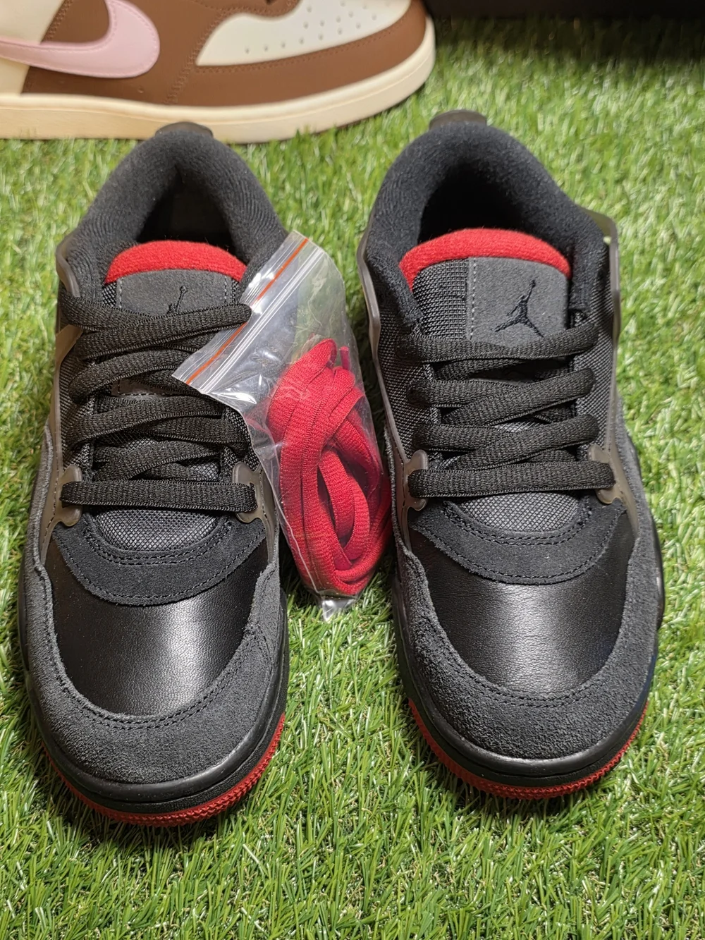 Nike Men's Black Sneakers with Red Accents